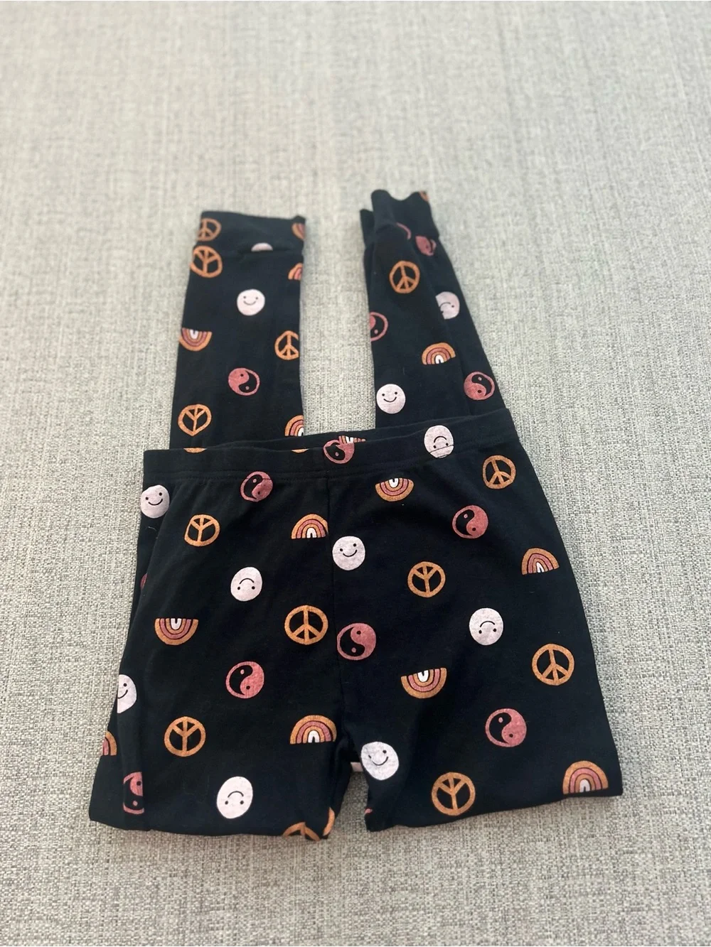 Carter's Black Pajama Set with Peace Signs, Rainbows & Smiley Faces. Size 10